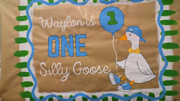 Silly Goose first birthday banner painted by hand
